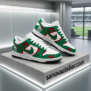 Custom Hello Kitty Mexico Soccer Air Force 1 Sneakers 9 Personalized Mexico Hello Kitty custom low-top sneakers featuring green Aztec-inspired patterns, red and white accents, Hello Kitty bow graphics, customizable name text, and Mexico-themed patches, displayed on a modern showroom pedestal with sanovaatelier.com branding.