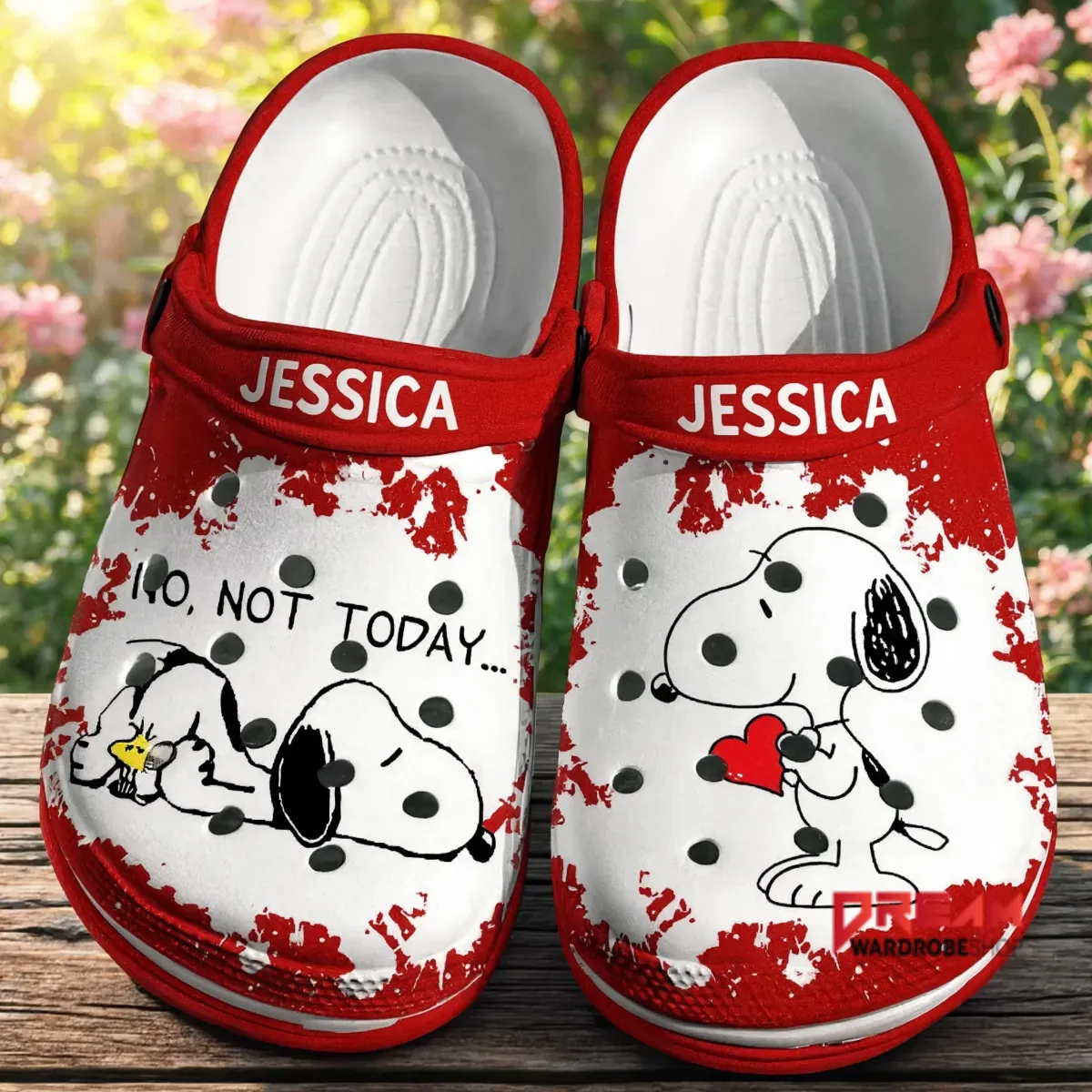 Front view of personalized red Snoopy clogs with sarcastic text.