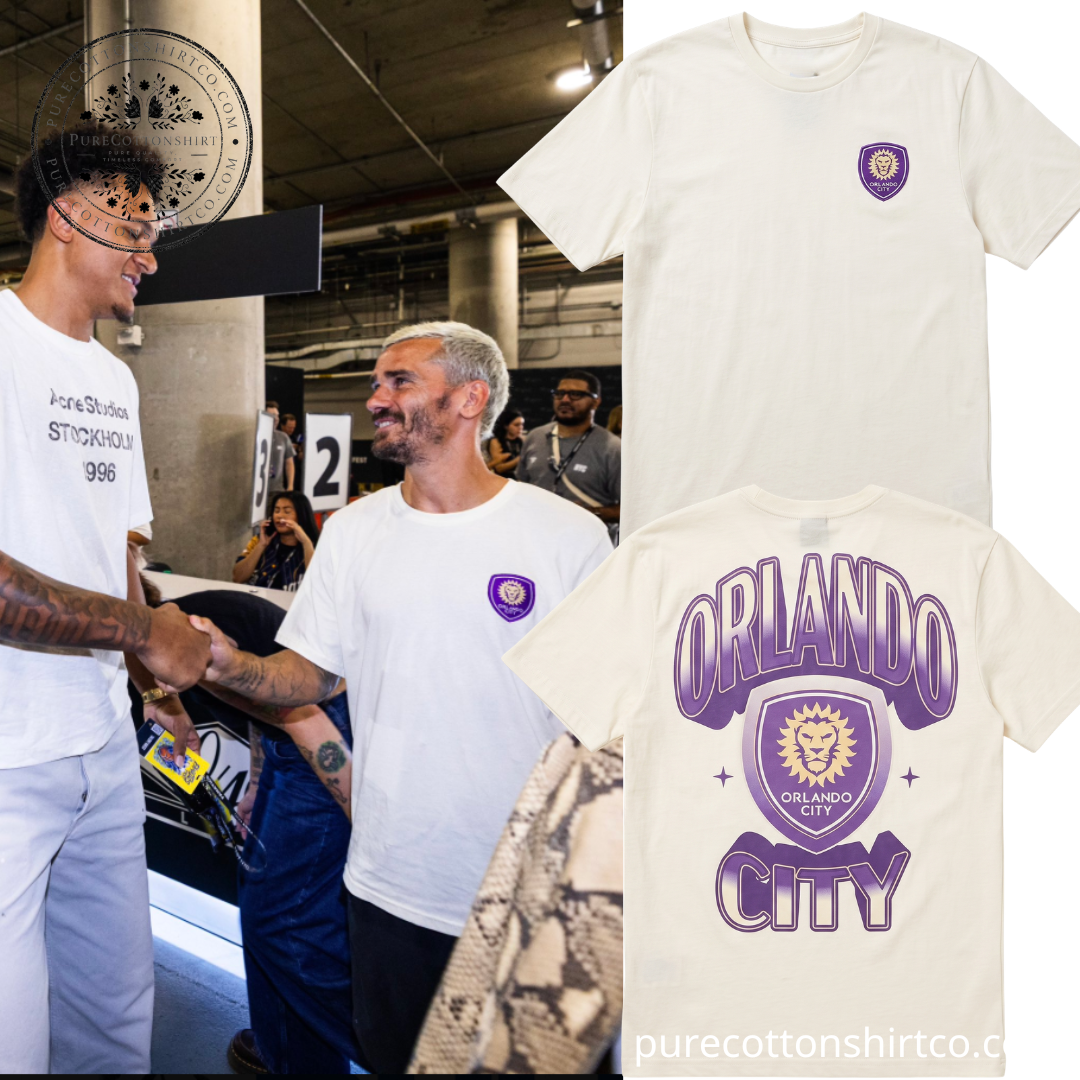 Antoine Griezmann Orlando City SC Retro Graphic Shirt - At Fanatics Fest in New York alongside NBA player Paolo Banchero