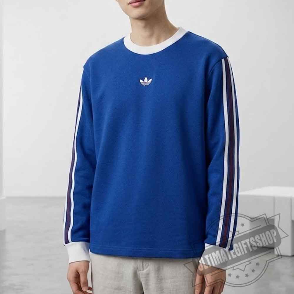 Timothee Chalamet Wearing Adidas Originals Royal Blue 3-Stripes Sweatshirt At World Cup 2026 Final Match (2) Timothee Chalamet Adidas Royal Blue 3-Stripes Sweatshirt - World Cup 2026 – image 3 of 3