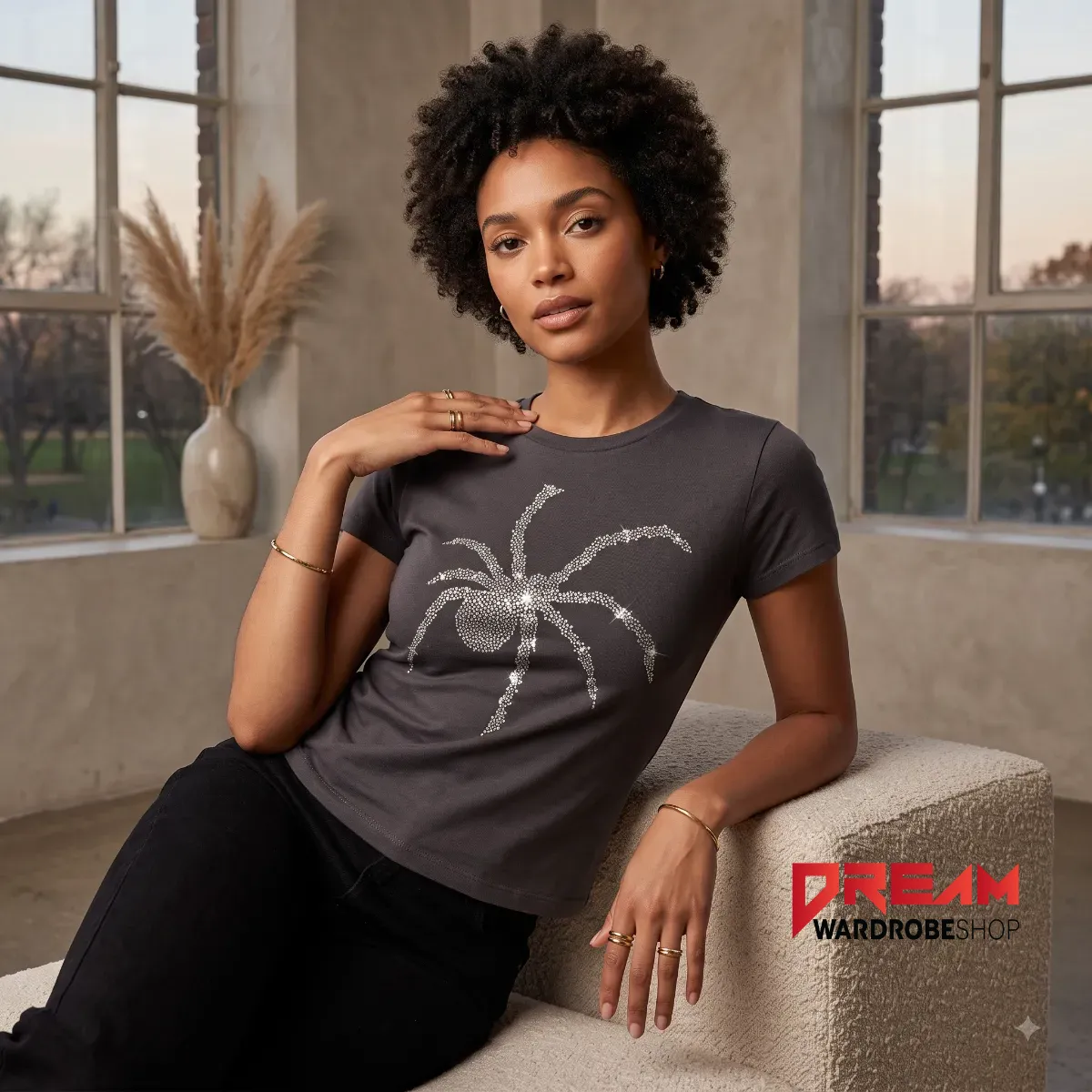 Press Tour Zendaya Spider Black Crop Women Baby T-Shirt worn by MJ (Zendaya) in Spider-Man: Brand New Day 2026 5 A person wearing the black spider graphic t-shirt in a stylish, casual setting.