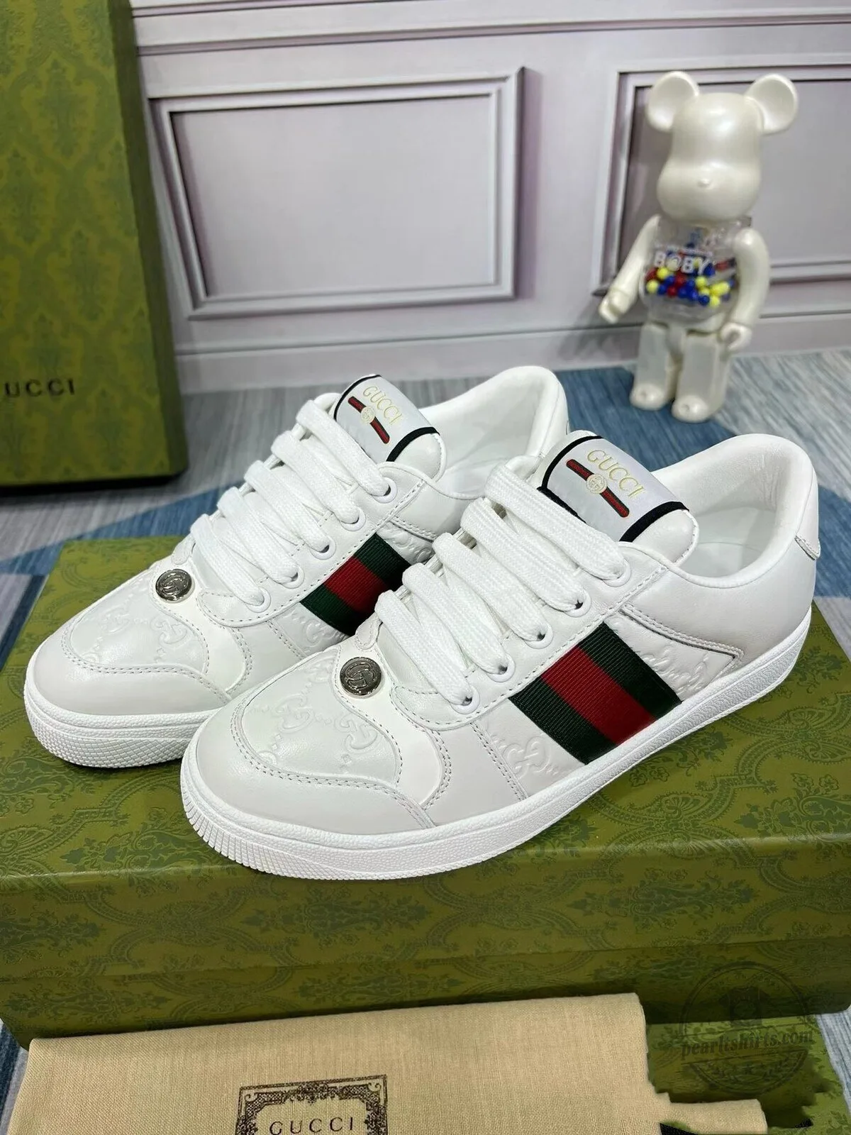 Low-Top White Leather Sneakers by Gucci Featuring Web Stripe Design