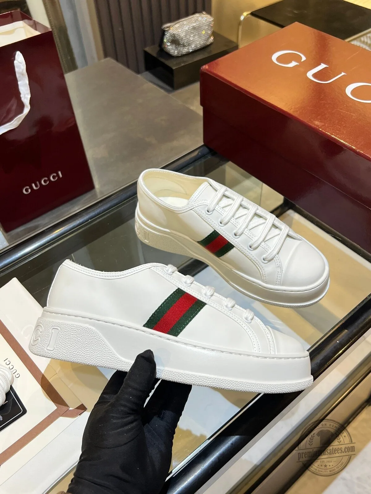 Gucci White Leather Low-Top Sneakers with Red and Green Web Stripe Detail