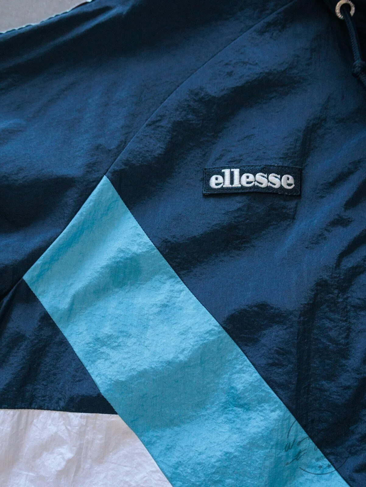 Vintage Navy Ellesse Colourblock Windbreaker Jacket with Taped Sleeves 8 Vintage Navy Ellesse Colourblock Windbreaker Jacket with Taped Sleeves