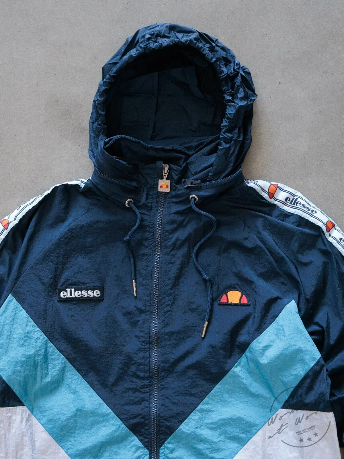 Vintage Navy Ellesse Colourblock Windbreaker Jacket with Taped Sleeves 9 Vintage Navy Ellesse Colourblock Windbreaker Jacket with Taped Sleeves